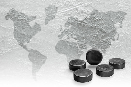 Hockey pucks and image map of the world