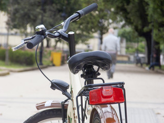 Obraz premium bike in a street with red rear light