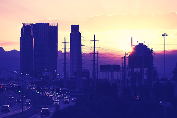 Fototapeta na wymiar Vintage toned picture of downtown Las Vegas silhouette at sunset, USA.