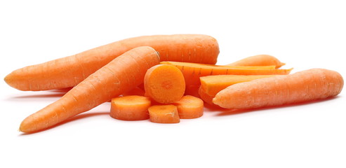 Carrots, slices pile isolated on white background 