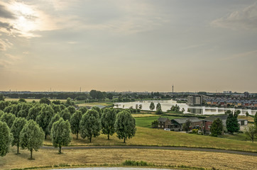View from an artificial hill towards the lake at the edge of suburb Carnisselanden near Rotterdam