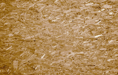Fiberboard. Compressed light brown wooden texture.