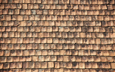 Roof tiles made from a ceramic material.