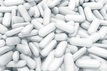 A lot of white pills scattered on a blue background. 3d illustratio