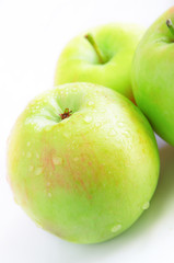 Moisture drops on green apple