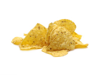 Tzatziki sauce flavored corn tortilla chips pile isolated on white background