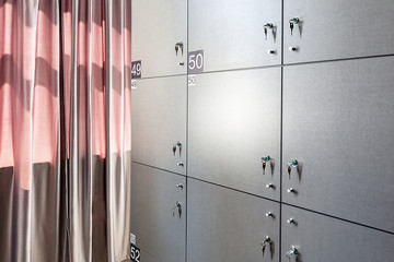 Row of lockers with numbers in modern hostel