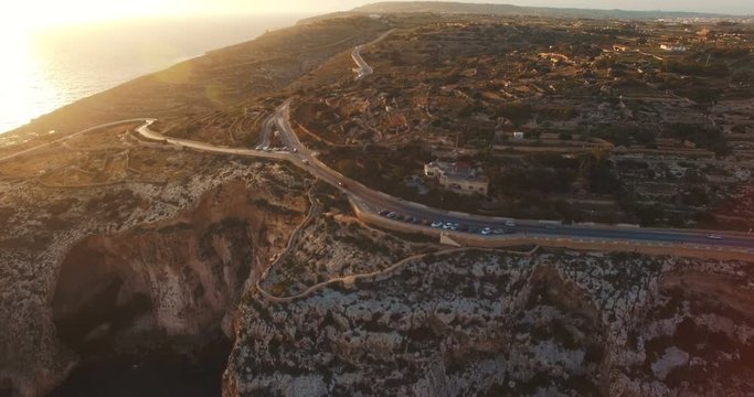 Aerial shot of European Maltese Cliffs during Sunset