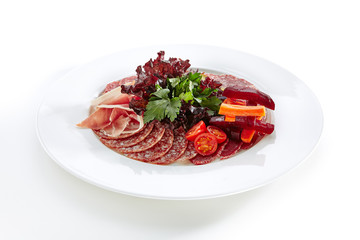 Antipasto with Sliced Meat and Greens Isolated on White Background