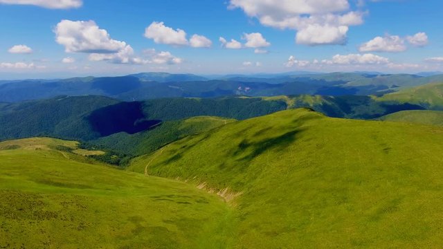 Aerial shot of a thin gorge in the Carpathian Mountains highlands in summer