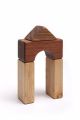 wood block make a something stacked  isolated white.
