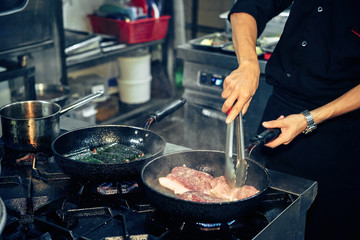 Cooking meat on stove