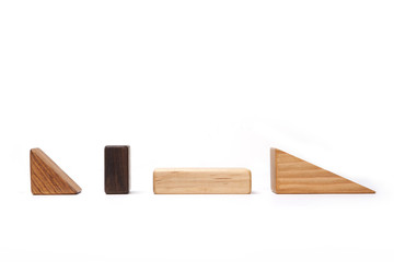 wood block make a something stacked  isolated white.
