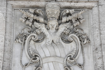 Italy, Rome, basilica of San Giovanni in Laterano, papal coat of arms in the entrance hall.