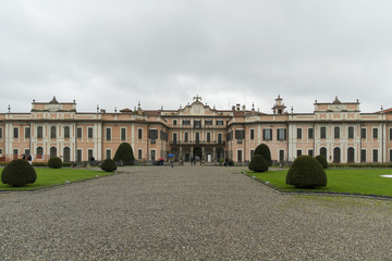 Obraz premium Estense Palace, or Palazzo Estense, the residence of Franchesco III d'Este, Duke of Modena and Reggio, and beautiful green park in front of it, Italy