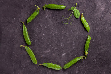 Frame for text from fresh, green, ripe peas pods