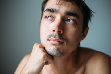 Obraz premium A man grows a mustache and beard. Soft focus