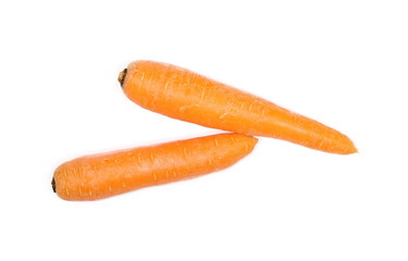 Carrots isolated on white background, top view