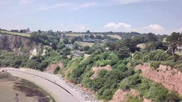 Beautiful Jurassic coast, rural township. Aerial footage. England.