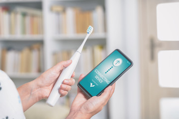 Connecting sonic toothbrush with smart phone app