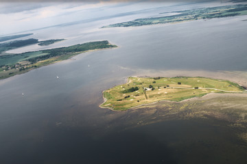 A few island on a very calm water