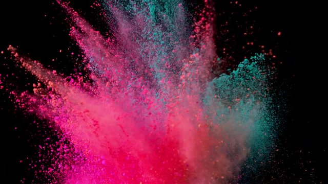 Super slow motion of colored powder explosion isolated on black background. Filmed on high speed camera, 1000 fps.