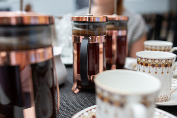 Closeup of a french press coffee at a café