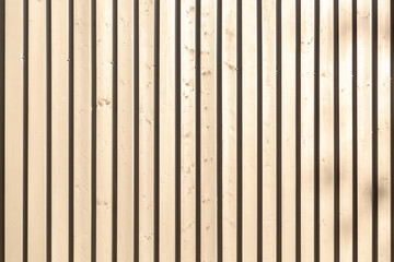 Naklejka premium Background of wooden narrow vertical bars