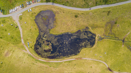Drone aerial view of the pond at Vivione mountain pass. Italian Alps
