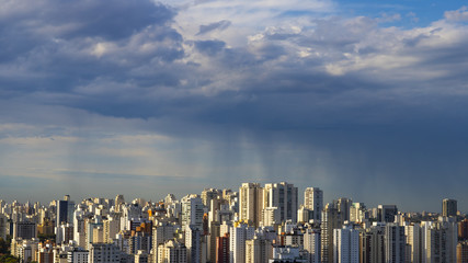 The skyscraper on the background of rainy cloud. Sao Paulo city Brazil South America 
