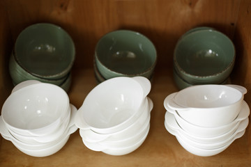 plates kit on kitchen shelf. dishes.crockery