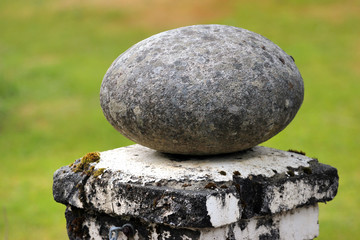 Decorative oval boulder in a park