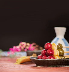 Japanese Dango dessert with 3 different color in pink(red), white, and green, recipe, hanami Dango, tsukimi Dango, copy space.