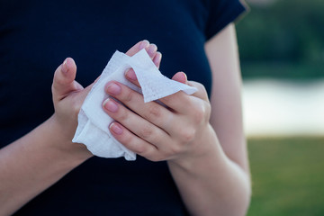 human hands wipe with a wet napkin body part