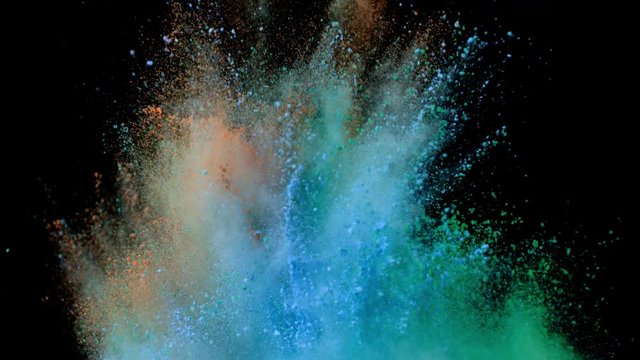 Super slow motion of colored powder explosion isolated on black background. Filmed on high speed camera, 1000 fps.