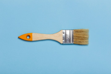 paint brush on a blue background