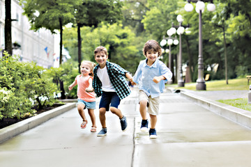 Fototapeta premium Portrait of adorable brother and sister together outdoors. happy lifestyle kids