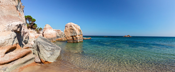 Rock formations of the cliffs and beaches of the island of San Pietro in Sardinia, Italy.