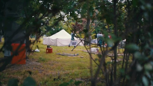 Peaking Through A Shrub, Hiding, Stalking On People With A Tent