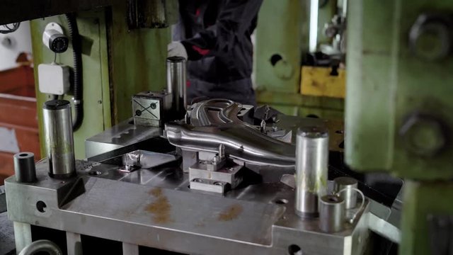 press production. Machine parts are produced using a sheet steel mold. Vehicle suspension part
