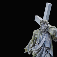 The road to Golgotha. Ancient statue of Jesus Christ with cross. (holy, faith, religion, God,...