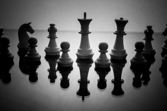 King of a chess game isolated on a white background symbol of a leader