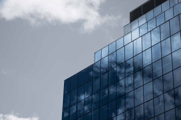 Fototapeta na wymiar Modern design building with glass windows