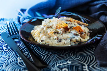 risotto with fresh cream, salted chicken, rehydrated ceps and mushrooms
