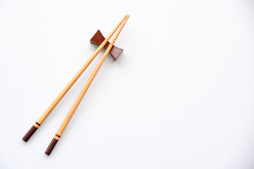 wood Chopsticks on White background Copy space.