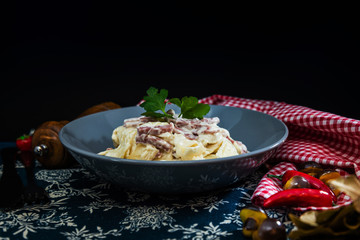 Pasta Torti with Carbonara and smoked bacon