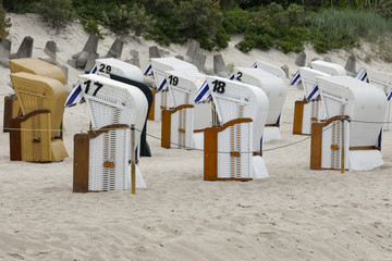 Hooded beach chairs on the beach