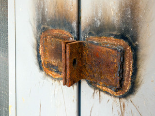 Large loops for a padlock. Rusty metal.