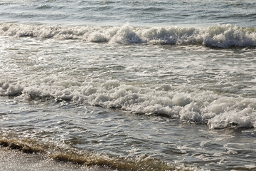 The waves of the Baltic Sea reach the shore