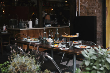 italian meal on rustic table at modern restaurant